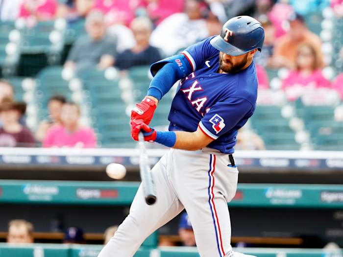 Jul 21, 2021; Detroit, Michigan, USA; Texas Rangers center fielder Joey Gallo (13) hits a single in the second inning against the Detroit Tigers at Comerica Park.